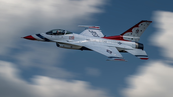 US Air Force F-16 Falcon - Thunderbirds Opposing Solo tears up the sky Print