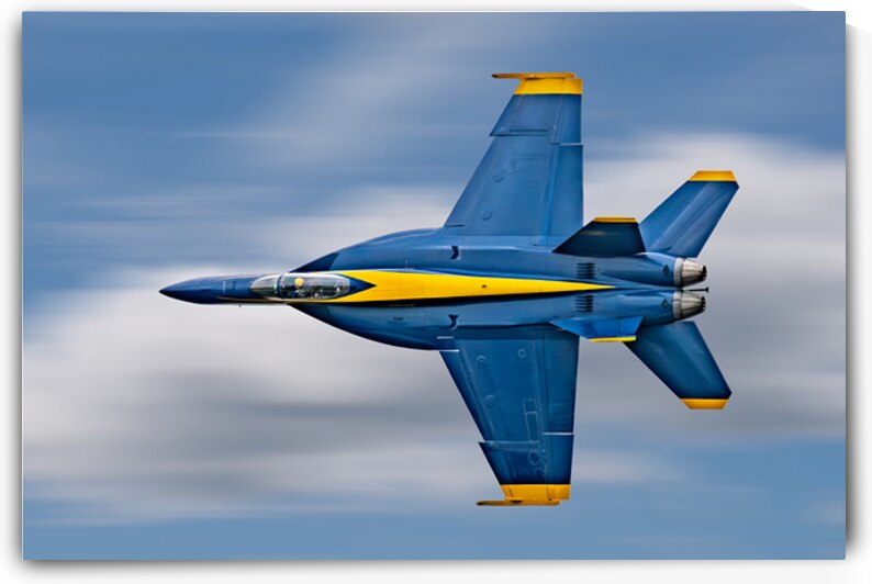 US Navy F-18 Super Hornet of the Blue Angels races across the sky by Pisarek Photography