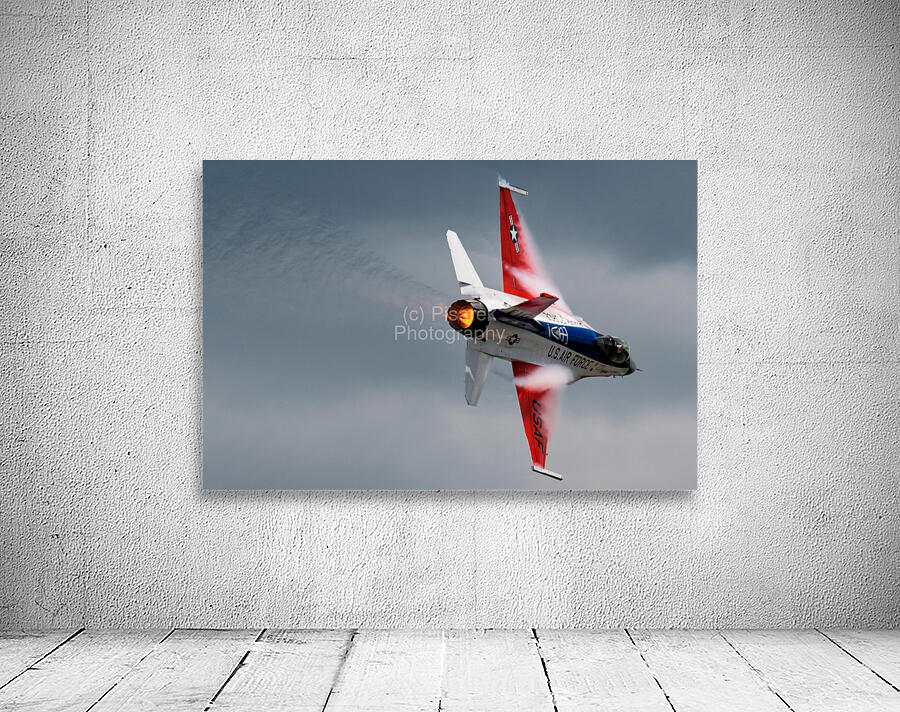 A United States Air Force F-16 Viper races across the sky afterburner ablaze Wall Preview